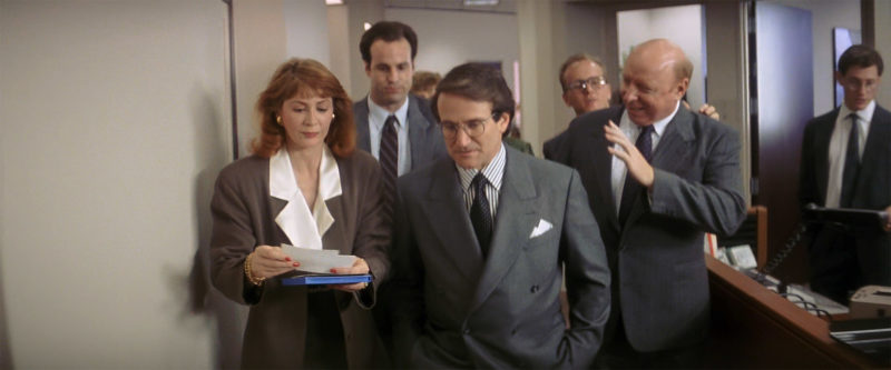 Ron holds him back as he appears to approach Peter.