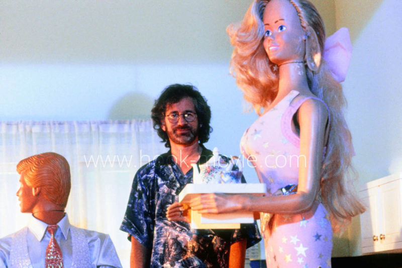 Steven Spielberg on the dollhouse set.