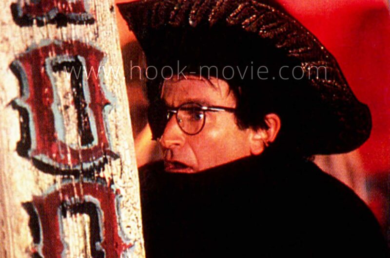 Stunned, his eyes fixed on Smee and the pirates