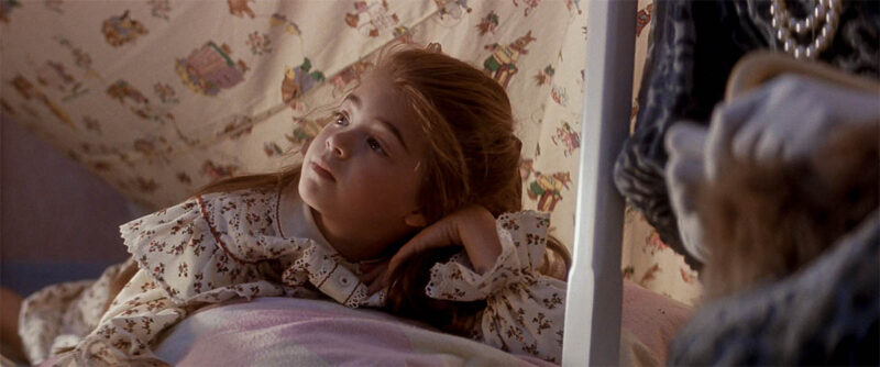 Maggie beside Wendy, fully absorbed in the story.