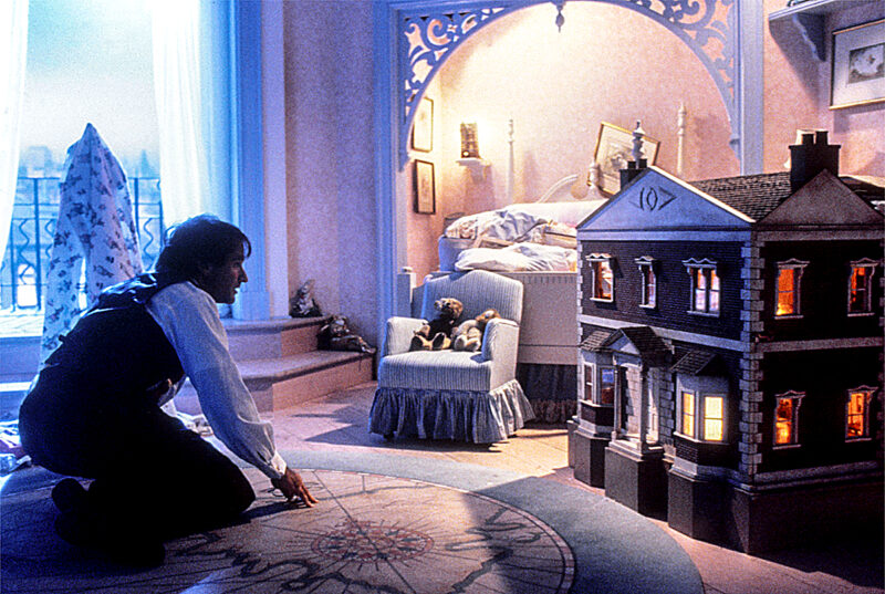 Peter submitting himself to interact with Tinker Bell, the miniature being of light.