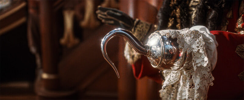 The crew reflected in the hook.