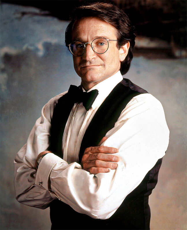 Peter finds a safety pin on a teddy bear, which he uses as a cufflink. Clearly visible in this promotional photo.