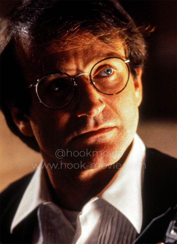 Peter gives Moira a defiant look, as if provoking her, before answering the call without waiting for her approval.