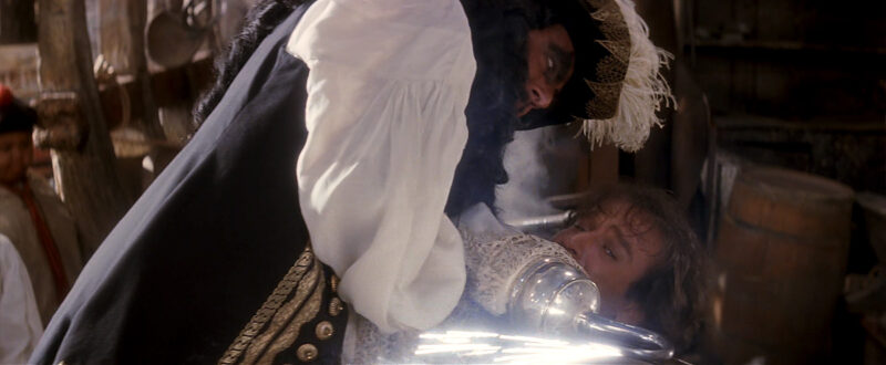To gain the advantage over Peter, he forces him to look at the reflections in his hook.